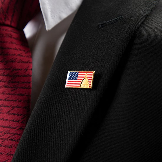 american flag pin on shirt